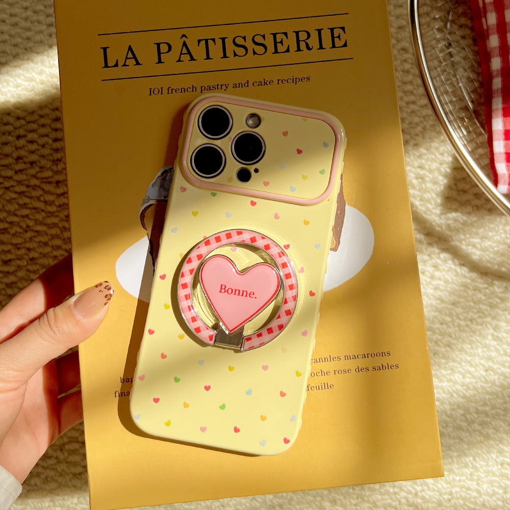 Trendy, custard-yellow iphone 17 case with a full-color heart design and stand. available in contrasting color iphone 18 soft case styles
