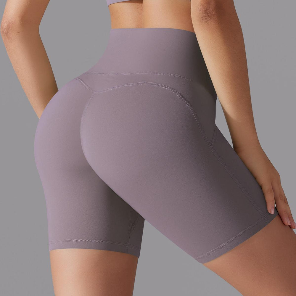 Naked-feel, high-waisted, butt-lifting yoga shorts – perfect for running, fitness, and a custom-made, three-quarter length fit. sampling and oem manufacturing available