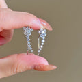 Korean-style exquisite diamond-studded flower stud earrings with an integrated ear row design. a touch of luxury, elegant and chic. trending influencer-approved accessories