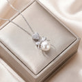 8442 pearl heart bow steel color necklace