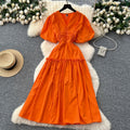 French-inspired, niche v-neck dress with ruched waist, puff sleeves, and a flowy, a-line silhouette. perfect for a slimming and elegant summer look