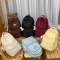 New schoolbag large capacity water-resistant embroidered backpack for junior and senior high school students - solid color, simple, and cute design