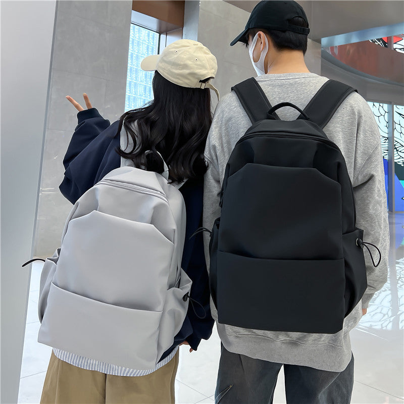 Campus Japanese backpack versatile male and female junior high school college student schoolbag solid color casual large capacity travel backpack