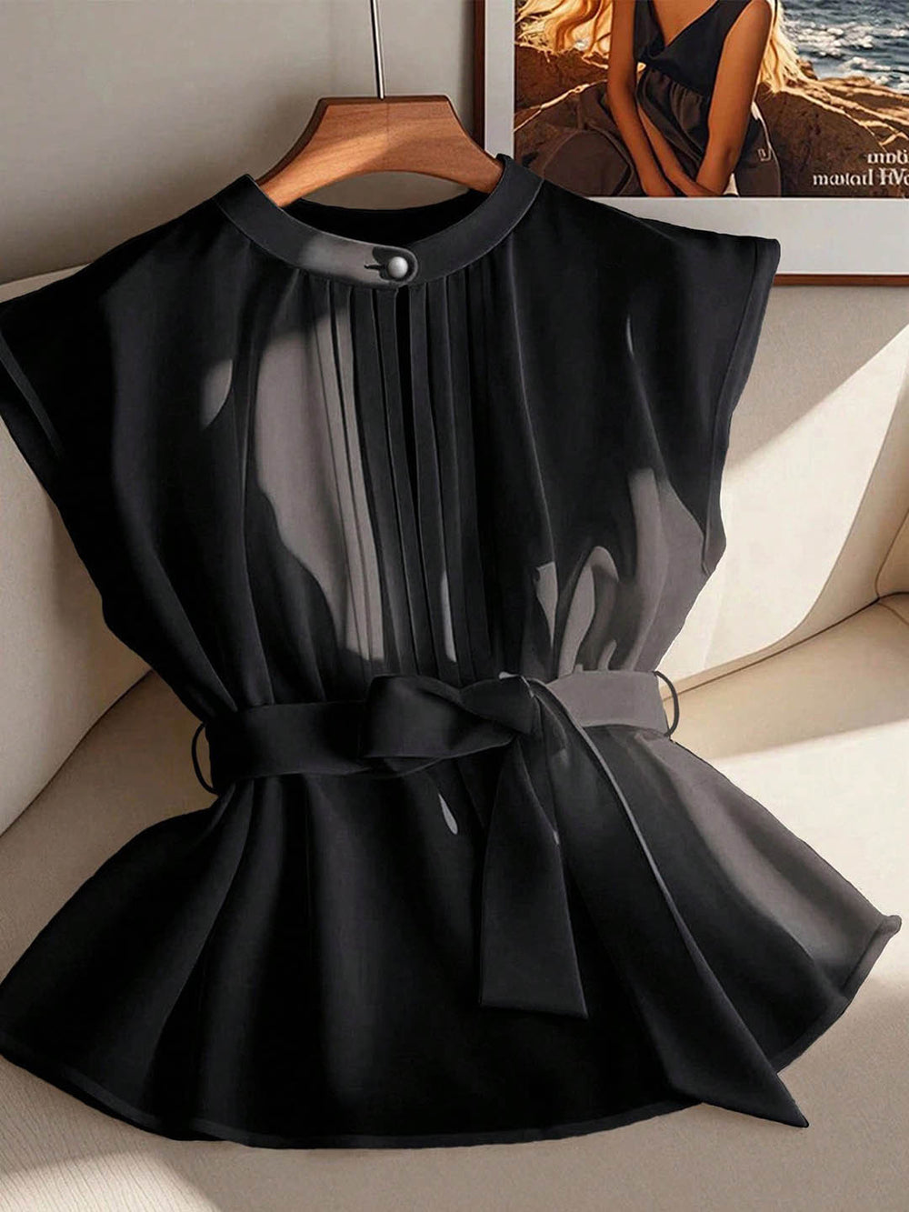 plus size french sleeveless top with stand collar, single button, chest pleat, tie waist, semi-sheer and flowy