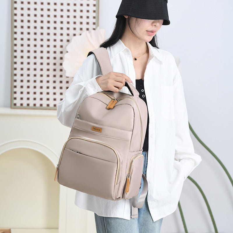 New commuter backpack women's large-capacity women's backpack fashionable anti-splashing nylon bag solid color student schoolbag
