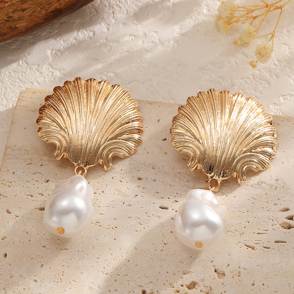 Wholesale ocean breeze earrings: european and american cross-border jewelry, versatile scallop-shaped, niche, high-end faux pearl pendant earrings for women