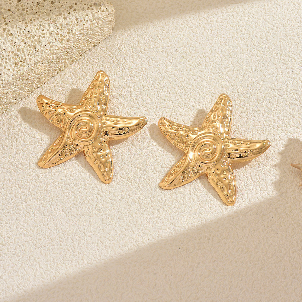 Wholesale seaside earrings: cross-border summer ocean resort style alloy starfish earrings for women - european and american niche exaggerated dangle earrings