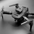 E100 four-sided obstacle avoidance drone 4kk6 quadcopter p8 air pressure fixed height remote control aircraft toy model aircraft