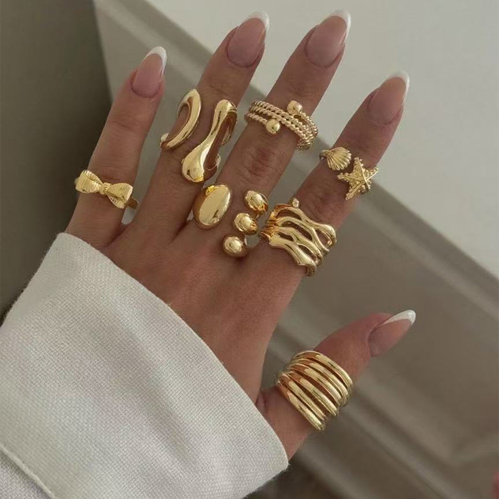 Wholesale fashion jewelry rings: european & american geometric, high-end bow, starfish, unique lava rock knuckle ring set for women