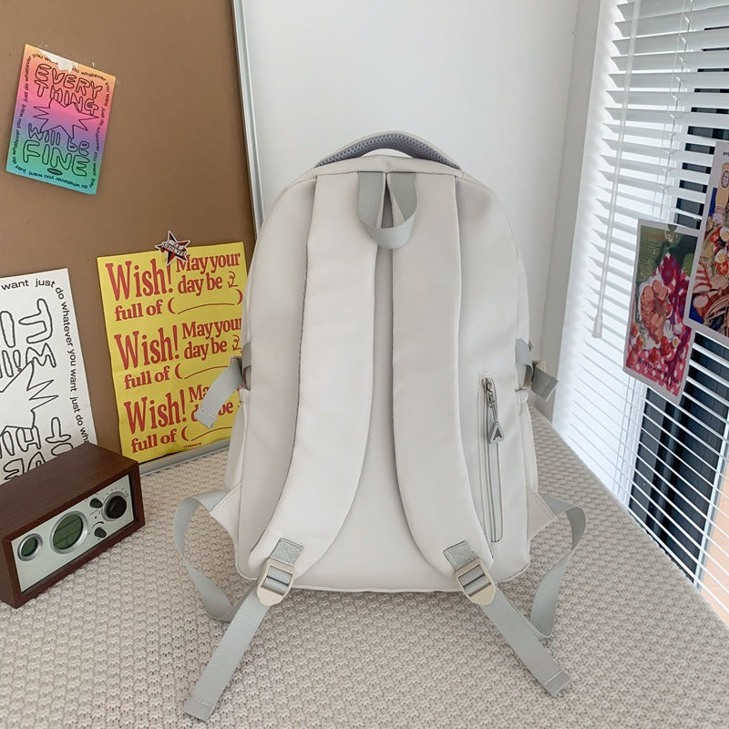 New Korean version of junior high school student schoolbag large capacity lightweight outdoor leisure bag trendy men's and women's backpack