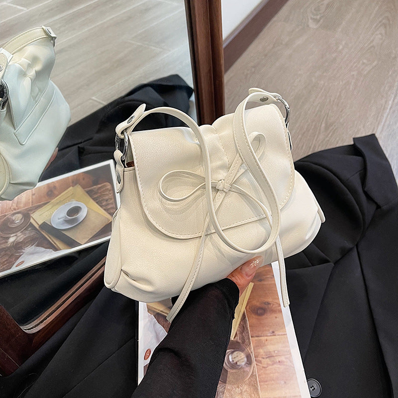 Solid color versatile bow small square bag women's bag 2025 new fashion simple shoulder bag foreign style portable commuter bag