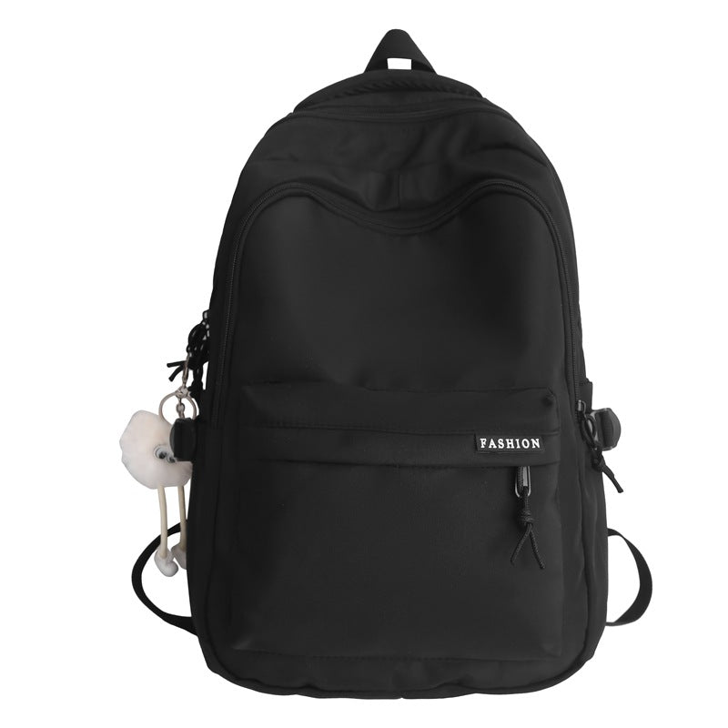 Large capacity burden reduction solid color backpack male junior high school student primary school bag female simple versatile travel backpack
