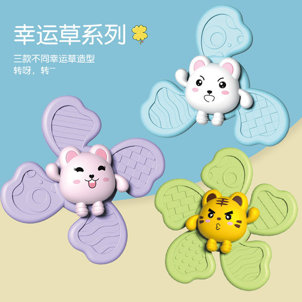 Cross-border baby suction cup rotating toy 1-3 year old baby turning flower fingertip gyro fun rotating rattle
