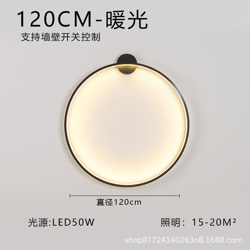 Minimalist chic large round wall sconce - stylish ambient lighting for living room backdrops, bedroom headboards, and more