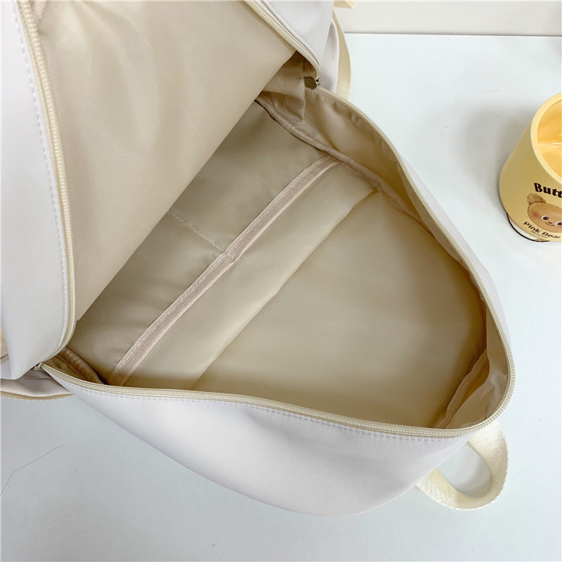 New high-value, fresh, sweet and cute female backpack, junior high school student schoolbag, light travel and large-capacity backpack.