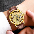 New men's watch - transparent case, skeleton design, simulated mechanical movement - men's leather strap quartz wristwatch - in stock, wholesale available