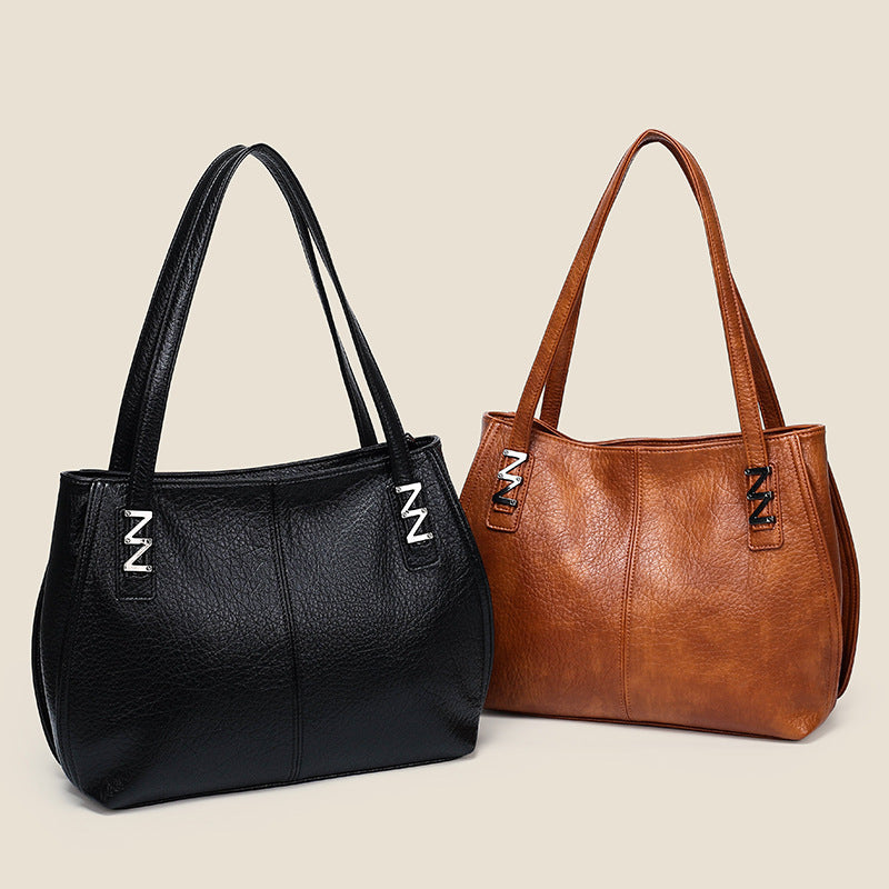 wholesale women's bags 2026: fashionable, minimalist, casual tote bags, large capacity soft leather shoulder bags, new mom bags