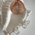 Wholesale butterfly earrings: european & american cross-border fashion jewelry for women - diamond-accented, versatile, unique alloy earrings with a sophisticated, niche appeal