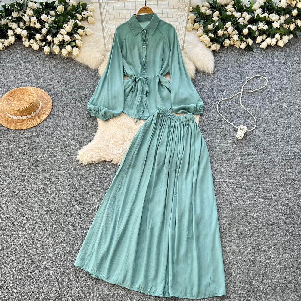 Minimalist solid color elegant women's spring outfit: bubble sleeve tie-up blouse + elastic waist slimming midi skirt