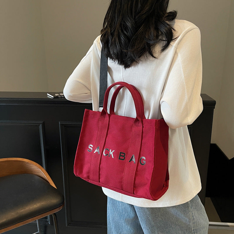 Cross-border women's bags new Korean version simple one-shoulder messenger bag women's letter printed tote bag retro portable canvas bag
