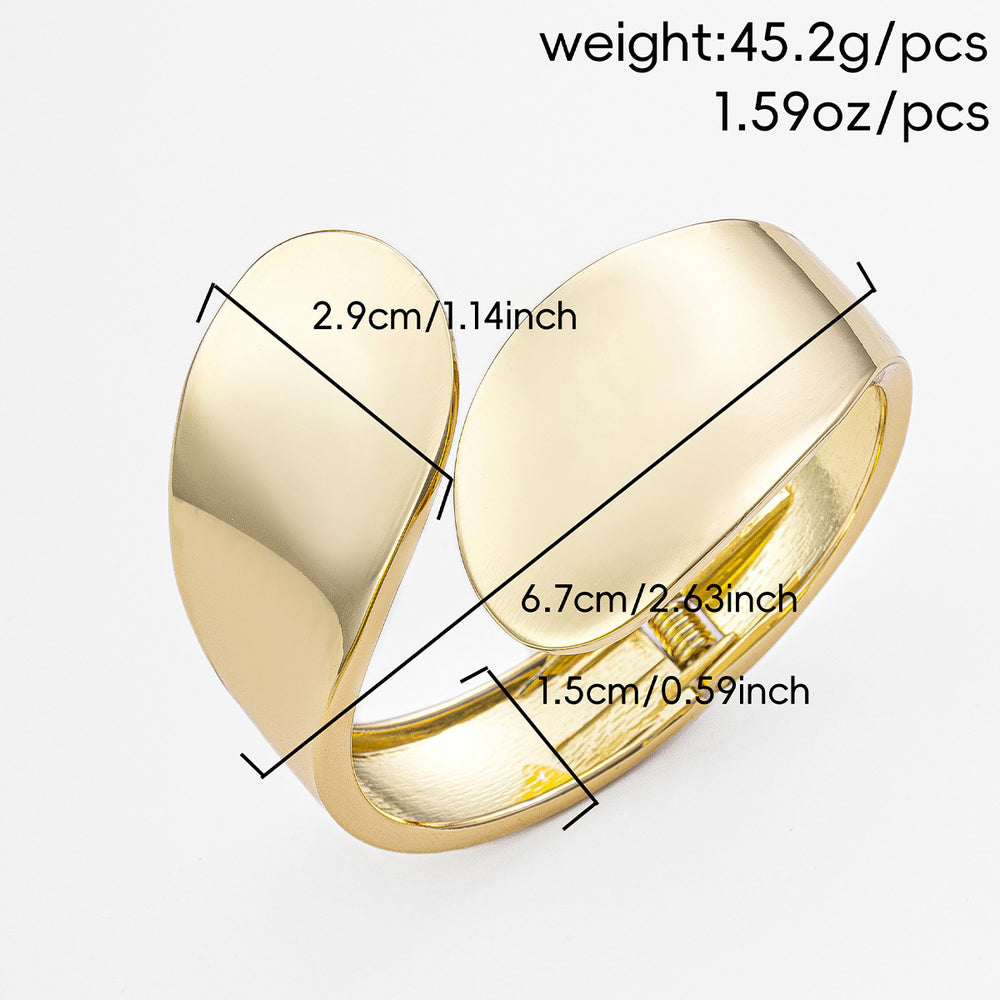 Wholesale glossy open bangle bracelets for the us and european cross-border e-commerce market. unique alloy bangles with an irregular design, perfect for women