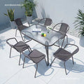 Outdoor table and chair set with umbrella, sunshade, perfect for outdoor cafes, bubble tea shops, and casual outdoor seating. features a wrought iron frame and rattan chairs, ideal for patios and gardens