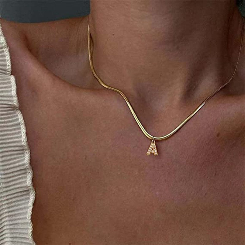 Geometric chic gold-tone blade chain necklace with letter pendant - stainless steel jewelry for women