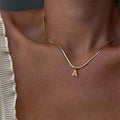 Geometric chic gold-tone blade chain necklace with letter pendant - stainless steel jewelry for women