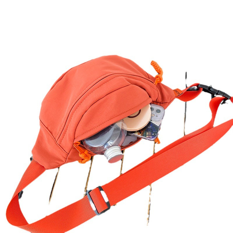 Sports fanny pack men's outdoor fishing anti-splashing fitness running mobile phone storage bag women's commuting travel messenger breast bag