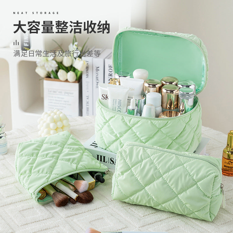 Yulang new down portable cosmetic bag large capacity portable storage bag waterproof high value travel toilet bag