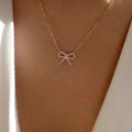 Customized necklaces: european and american cross-border jewelry, minimalist fashion bow pendant, women's zinc alloy diamond-studded necklace