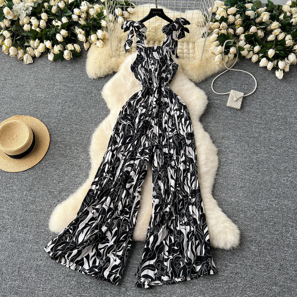 Women's summer jumpsuit for travel & vacation: stretchy, ruched, cinched waist, floral print, spaghetti strap, wide leg, long pants, beachwear