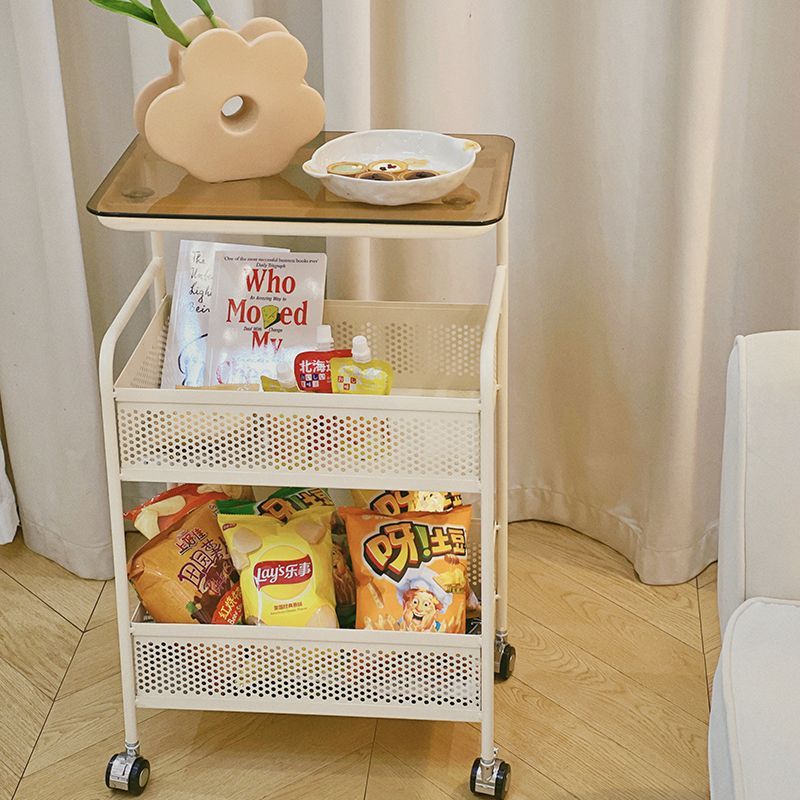 Cream style living room sofa next to several popular snacks multi-layer storage rack bedroom bedside table storage rack trolley