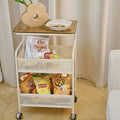 Cream style living room sofa next to several popular snacks multi-layer storage rack bedroom bedside table storage rack trolley