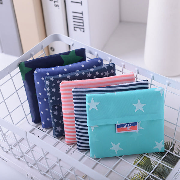 The manufacturer supplies environmentally friendly shopping bags, large-capacity storage bags, simple and modern flower cloth square bags, foldable large shopping bags.