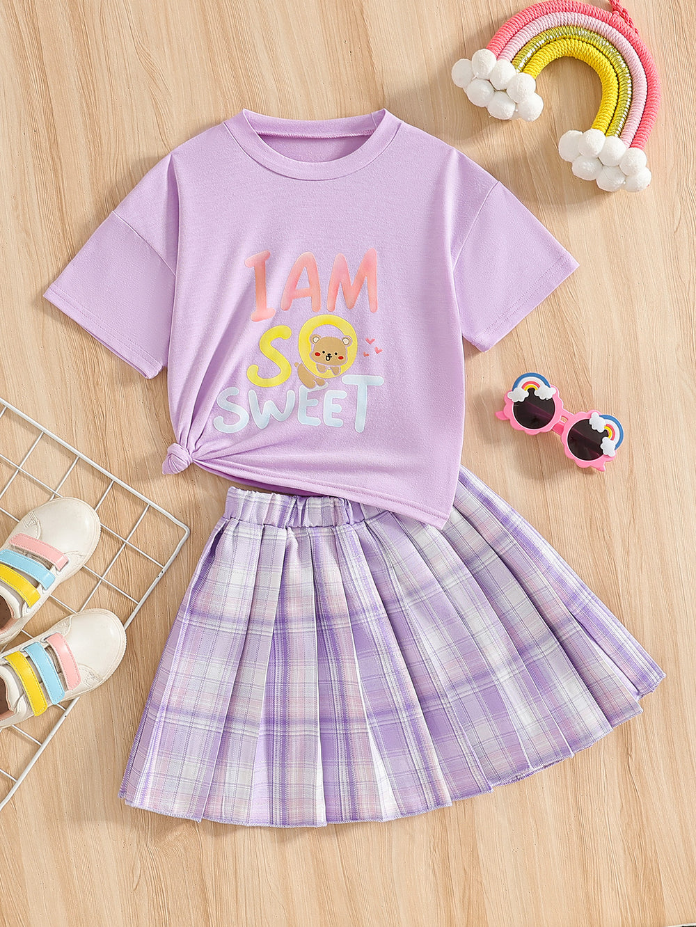 Girls' summer two-piece outfit: purple crewneck top with cartoon letter print and pleated plaid skirt set