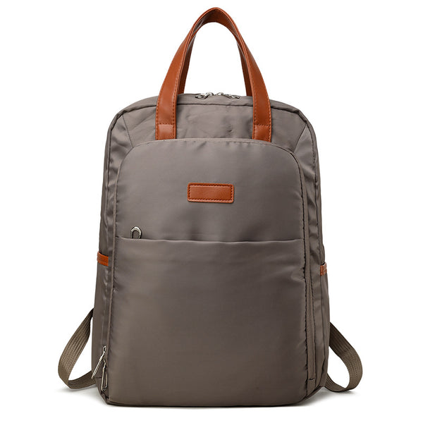 Korean version of simple backpack women's large-capacity computer bag backpack men's shock-proof schoolbag women's printing logo pattern