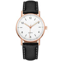 Rose gold white face black belt