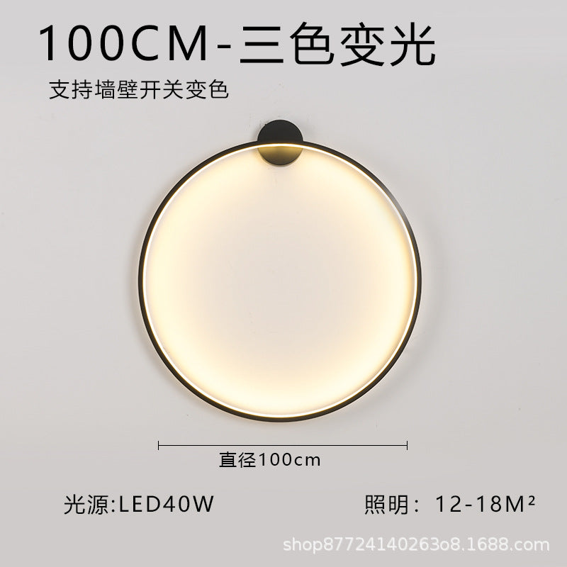 Minimalist chic large round wall sconce - stylish ambient lighting for living room backdrops, bedroom headboards, and more