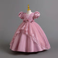 Ready-to-ship wholesale princess dresses with puff sleeves and lace detailing, perfect for children's formal wear, birthdays, piano recitals, and performances. kids' dresses