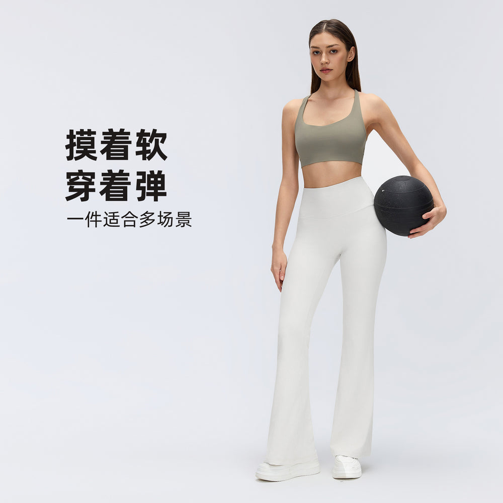 High-waisted, slightly flared yoga pants for women, designed to lift the hips, flatten the tummy, and create a slimming silhouette. these stretchy, barely-there feel leggings are perfect for pilates and other fitness activities. style d26017