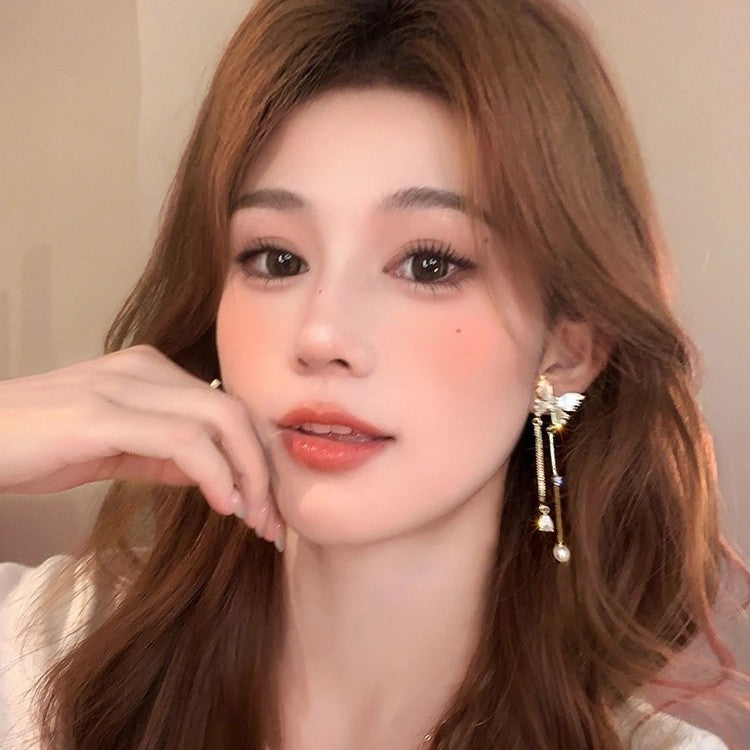 Sense of design butterfly tassel earrings for women classy sense of accessible luxury cool sense of earrings 2025new arrival asymmetrical earrings
