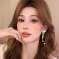 Sense of design butterfly tassel earrings for women classy sense of accessible luxury cool sense of earrings 2025new arrival asymmetrical earrings