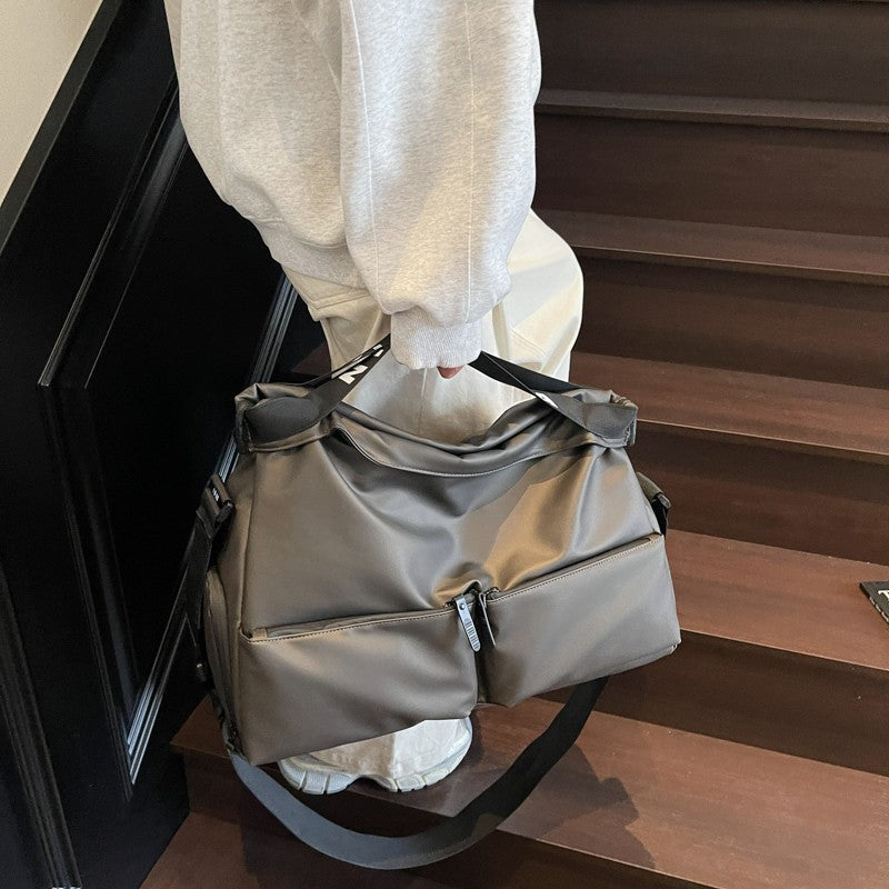 Sports fitness bag, men's and women's fashion, hand-held travel bag, multi-pocket short-distance luggage bag, crossbody boarding bag wholesale