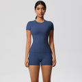 European and american style fleece-lined quick-dry short-sleeve yoga set with pocketed shorts for outdoor running and fitness