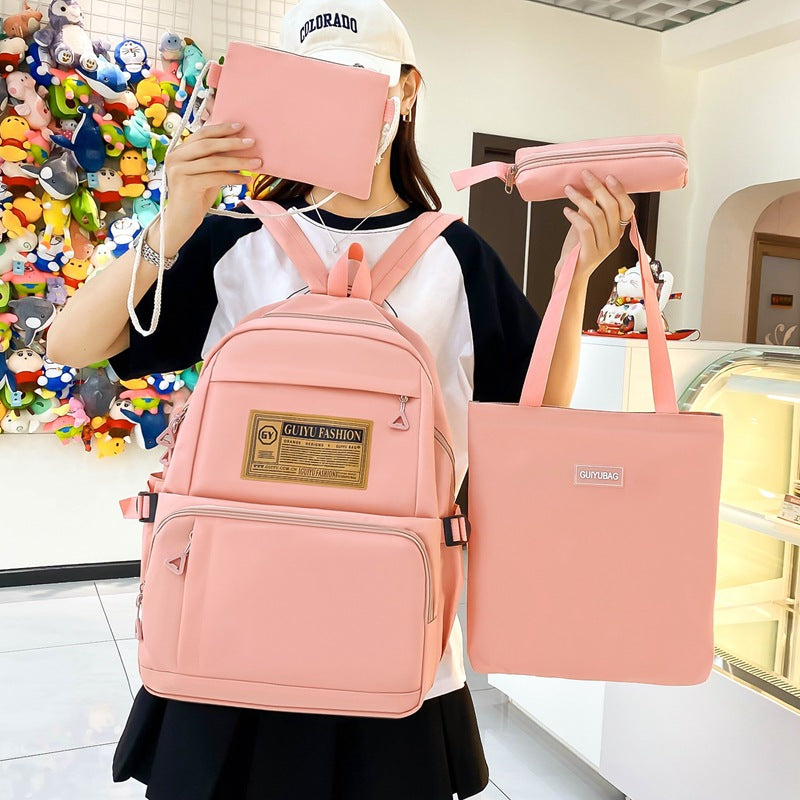 New primary and junior high school student schoolbag portable make-up bag four-piece Korean version simple backpack trendy campus backpack