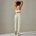 New seamless yoga set: high-waisted peach lift leggings with criss-cross back bra - sweat-wicking workout outfit for running and fitness