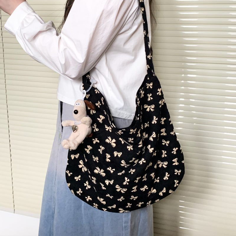 Cross-border new broken flower canvas bag messenger bag shopping bag fashion trend large capacity casual versatile women's shoulder bag