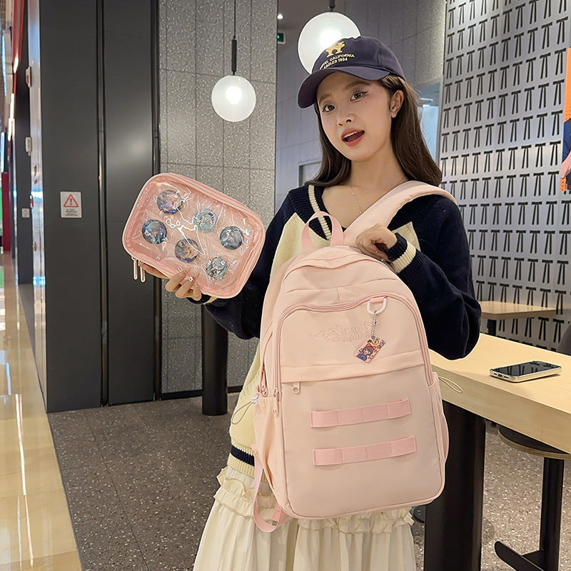 Solid color detachable badge personalized korean style high school student backpack large capacity minimalist versatile college student backpack