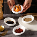 European minimalist pure white ceramic small sauce dish, suitable for home, restaurant, hotel, and business use. ideal for dipping sauces, condiments, and seasonings